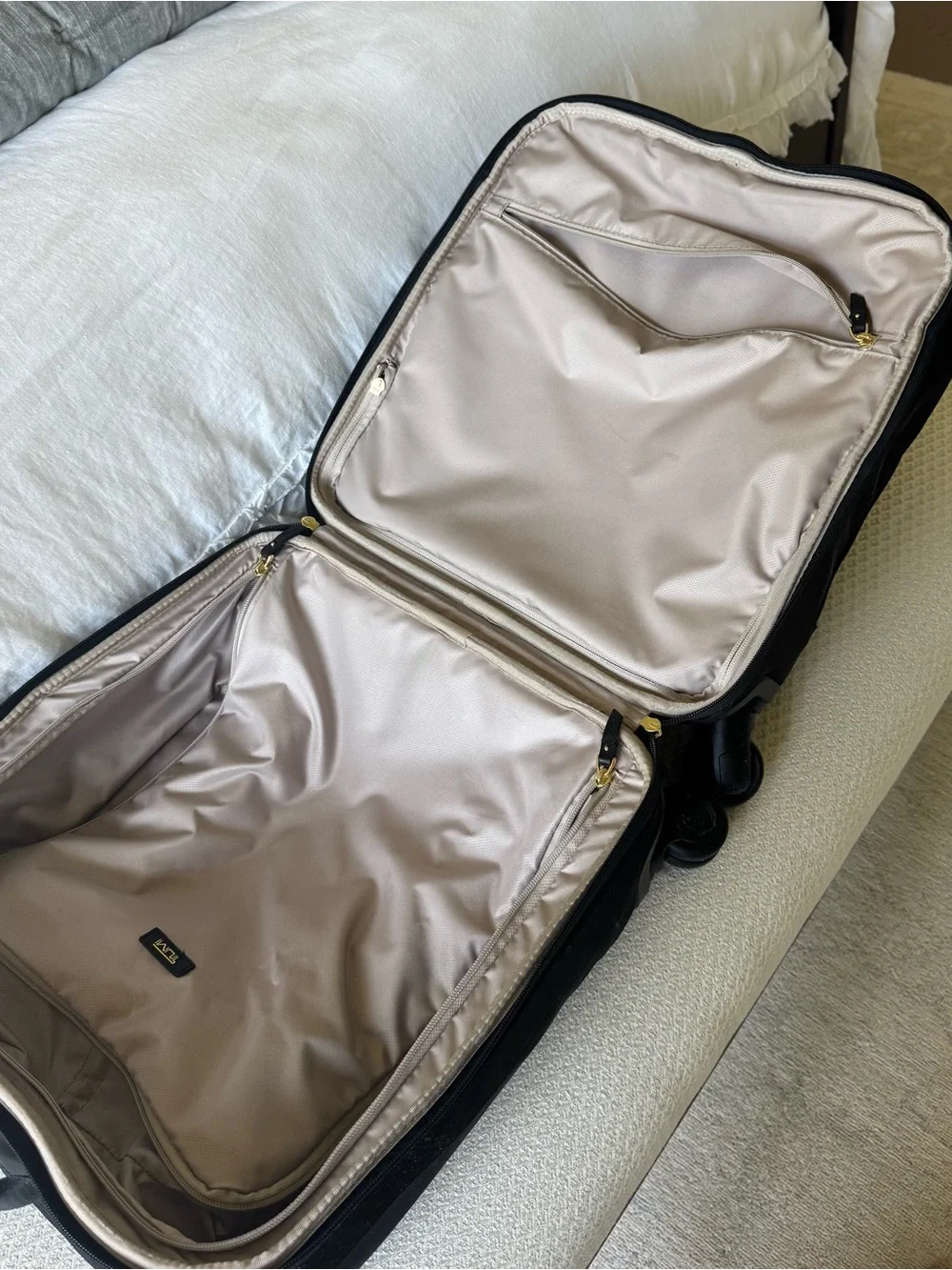 Tumi Black Travel Carry-On with Gold Hardware